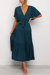Vestido largo con cinturón y volantes lisos